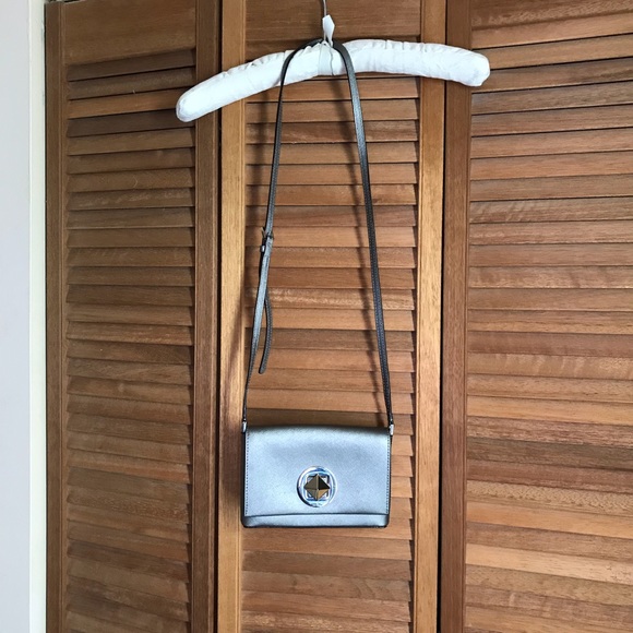kate spade Handbags - Kate Spade Silver Crossbody Purse EUC.